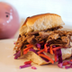 Illustration for article titled Any Sandwich That Costs More Than $12 Should Be Legally Obligated to Have a Side